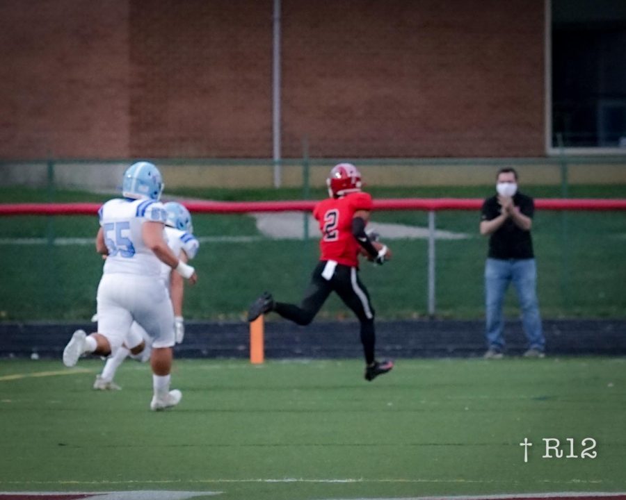 Kaden Saunders in the end zone for a Wildcat touchdown after an interception and running over 100 yards to score for the Cats against Olentangy Berlin on October 23.