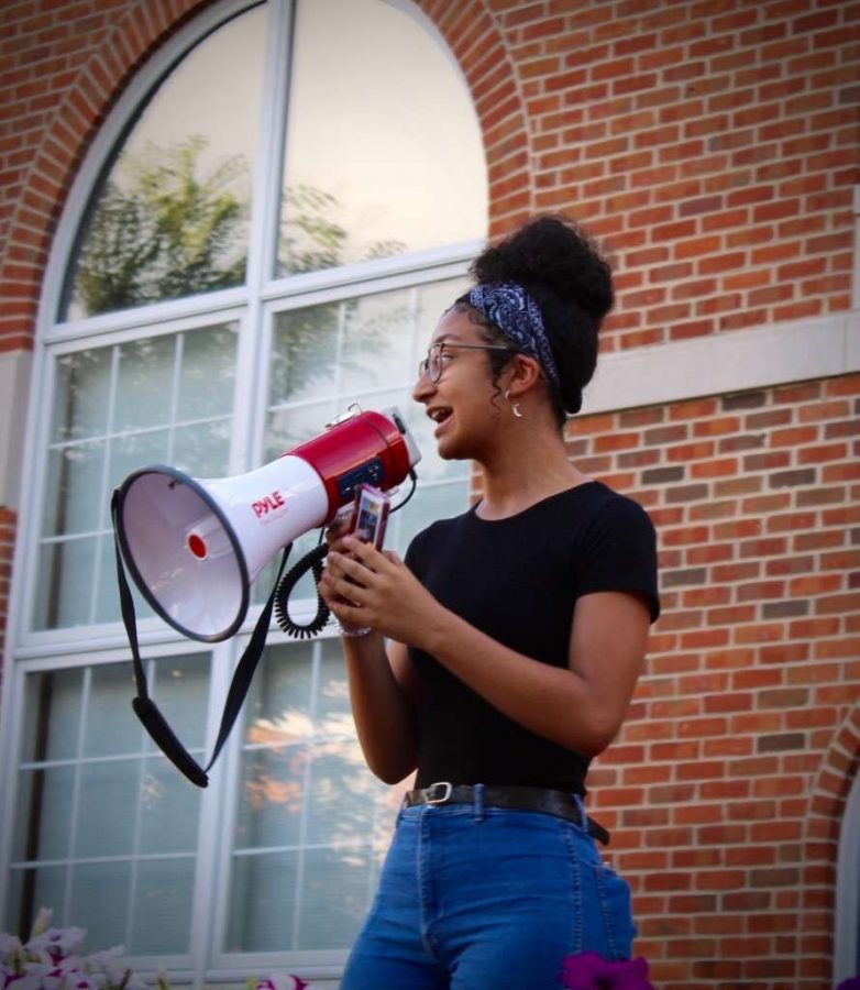 Westerville South junior, Isa Sánchez, speaking her poem at a Black Lives Matter gathering in Uptown Westerville.