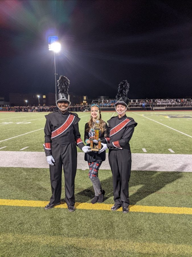 Westerville+Souths+Marching+Band+earned+5th+place+overall+and+3rd+in+their+class+at+the+Taylor+Premier+Show+on+Saturday%2C+Sept.+18.+Souths+Colorguard+also+finished+strong+with+a+3rd+overall+placement+among+17+competing+schools.+Featured+are+Drum+majors+senior+Lydia+Fyock%2C++junior+Wesley+Moore%2C+and+Colorguard+senior+Roslyn+Young.+Fyock+says%2C+It+was+nerve-wracking%2C+but+it+felt+like+all+that+I+had+worked+for+and+dreamed+about+was+finally+here%2C+at+that+moment.+%0A