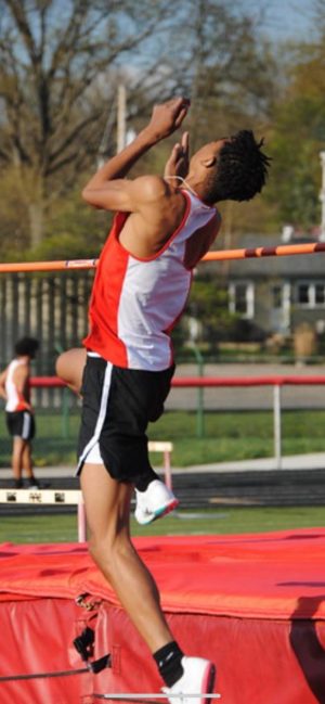 Reign Winston competing in the high jump event during a track meet