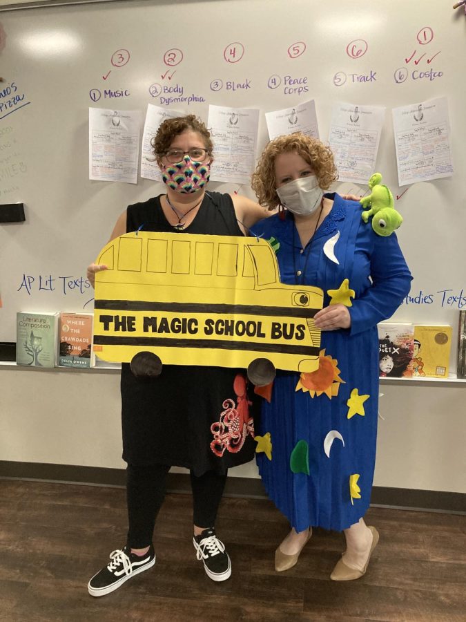 English teacher, Sarah Detrick dresses as Ms. Frizzle, and staff member Becky Rollo pairs with her to be the Magic School Bus for Who are You? Wednesday. 