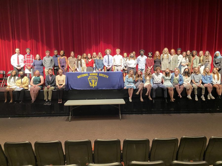 The 2021-2022 National Honors Society of Seniors leads an induction ceremony for new coming members on March 14th, 2022. 