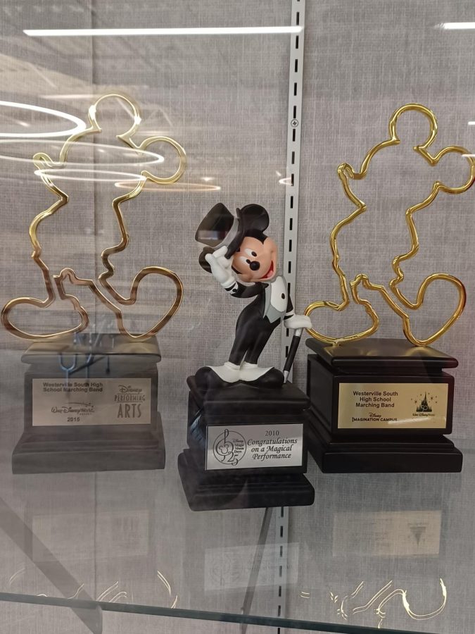 Pictured in the right in the commons trophy case is the marching band’s award for playing in Disney World during their 2021-2022 season. The Westerville South marching band has accumulated numerous awards and accolades such as this, which can all be seen in the trophy case. 