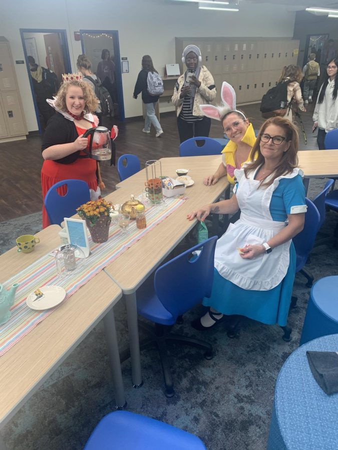 English teachers Sarah Detrick, Megan Messner, and Cassy Coggburn set up for there mid-day tea party.