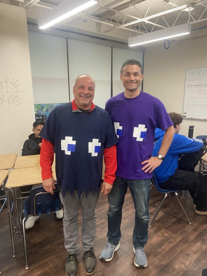Teachers, George Crooks and Stephen Quelette go along with the Math Departments theme by dressing as Pac Man characters.