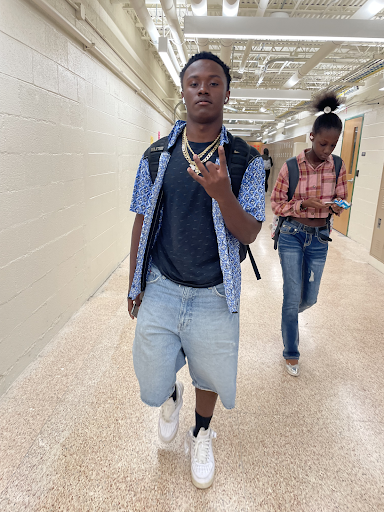 Junior Neyo showing off his snazzy senior fit during the fourth day of spirit week.