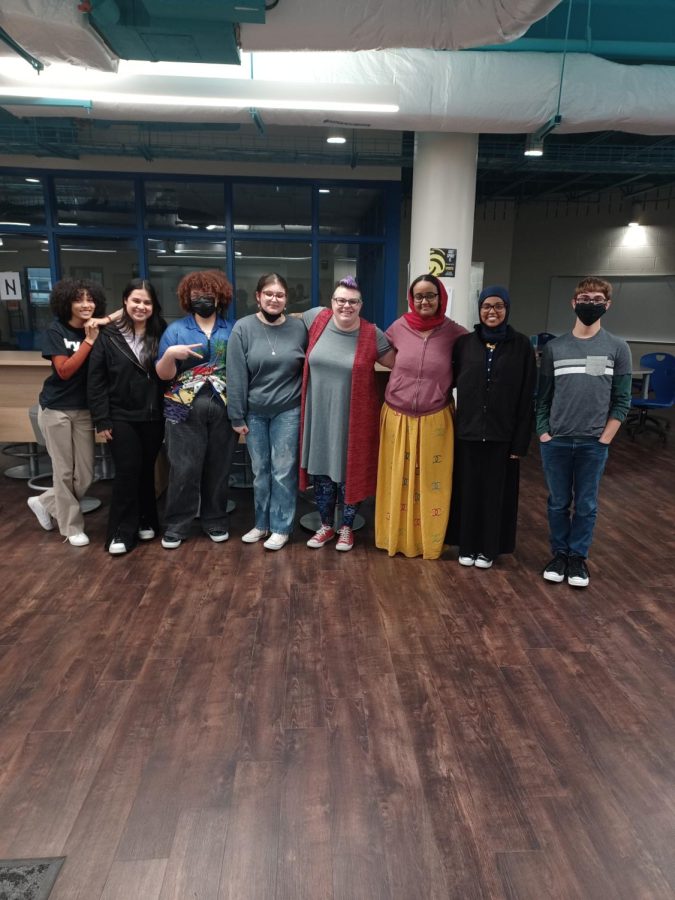 The current members of the Power to Poets club at the Oct. 19th informational meeting. Brandi Young and Nabiha Ilkaqor are 4th and 3rd from the right respectively.