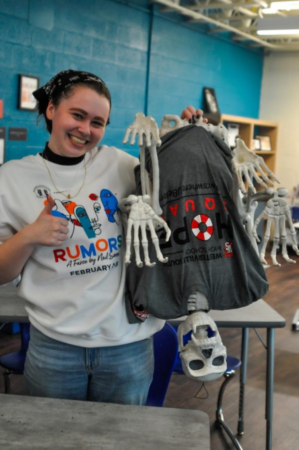 Junior Rylee Jennings brings a skeleton as a backpack to carry their things to and from their classes for Anything but a Backpack Day for Hope Squads Hope Week.
