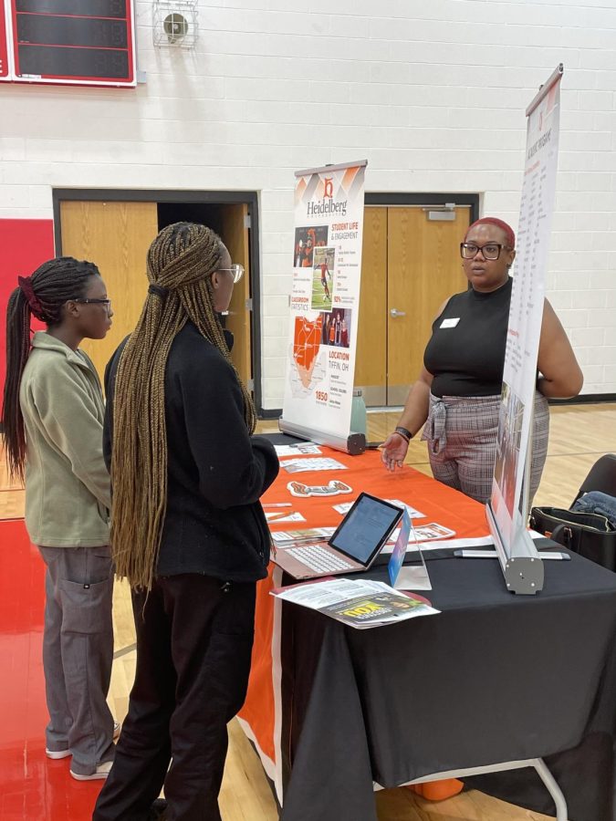 Kiera Harper, assistant director of admissions of Heidelberg, talks to two students at Westerville Souths college fair. No matter how many schools are in the room, youll always be exposed to different sizes of universities, programs, and extracurriculars... she said.