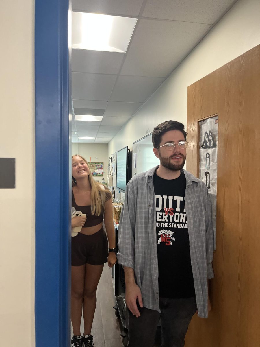 English teacher Jacob Miller and senior Emily Hoelscher poke fun at each other toward the end of his College Credit Plus class. Hoelscher said, I had Mr. Miller when I was a freshman and wanted to have him again...I also wanted to be able to get credit early on ... and I think it will prepare you for what college is like.
