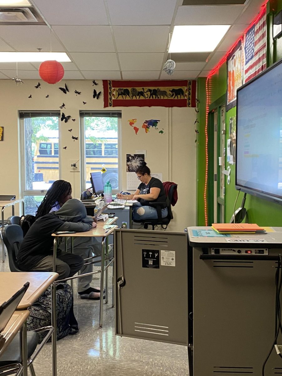 Finishing a busy first week of school, Rebecca Rollos 10th period Biology class spent time working on student catch-up days, allowing Rollo to focus more time working one on one with students who came to her with questions and finishing grading her first assignments of the year.