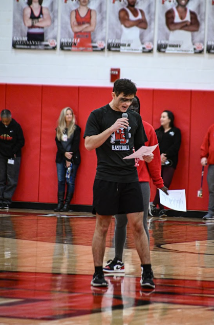 Senior Fletcher Fox introduces games and introduces the sports teams for the winter and spring season, showing off his blackout gear for the Westerville South v. Westerville North game.
