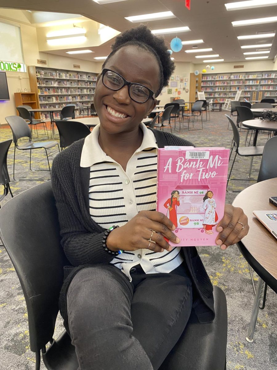 Senior Ama Twumwaa shows off her chosen book for the week. 