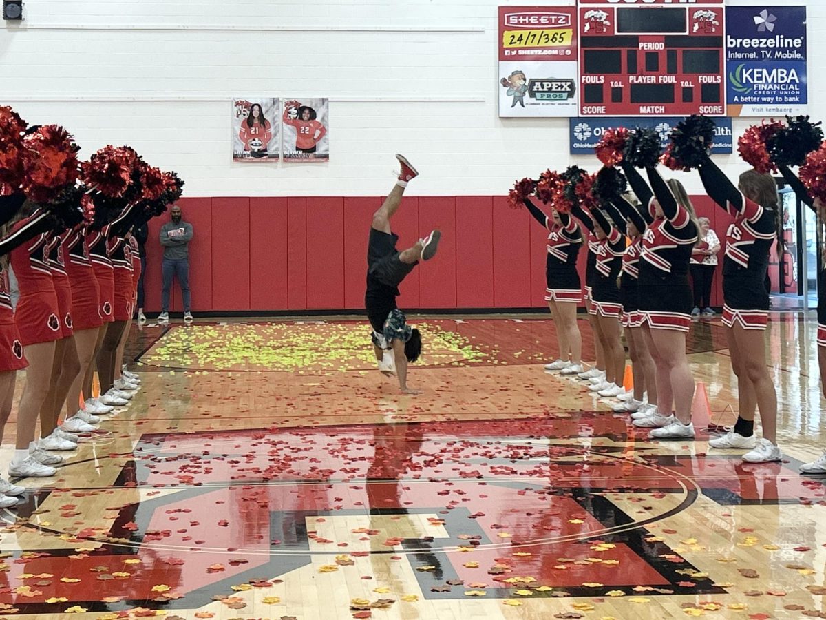 Owen Wiley, a Sophomore Cartwheels Down the Aisle After Winning Homecoming Court