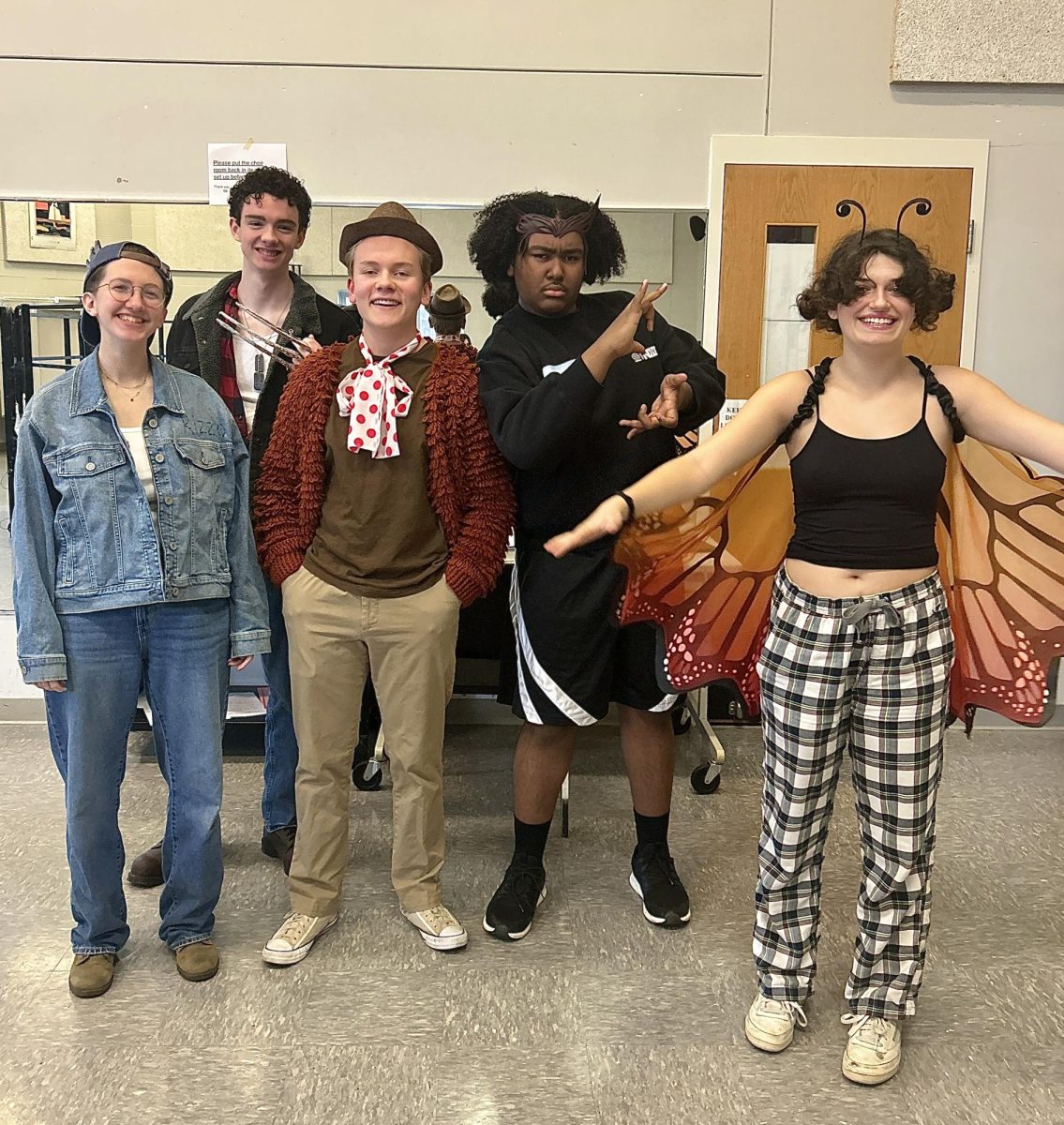 Students Xae Grace, Michael Mcwhorter, Josh Monson, Micah Carnes, and Ella Hanson show off their creative Halloween costumes on Thursday, Oct. 31. All five students are in Westerville South’s advanced level choir, Soundsations.