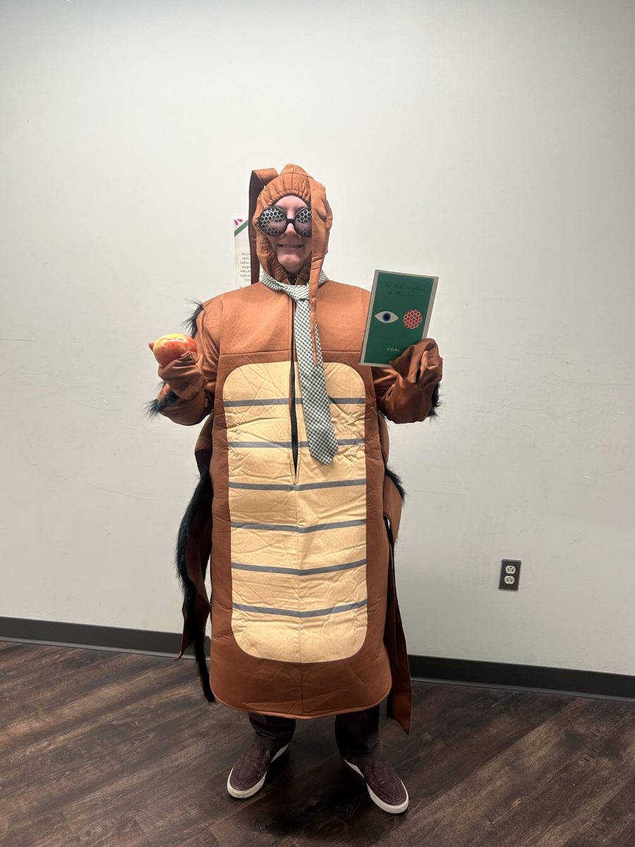 English teacher, Emily Swank, dresses as Gregor Samsa, a fictional bug character from the book "The Metamorphosis" by Franz Kafka. Being in the Halloween spirit, she planned to pass out candy last night.