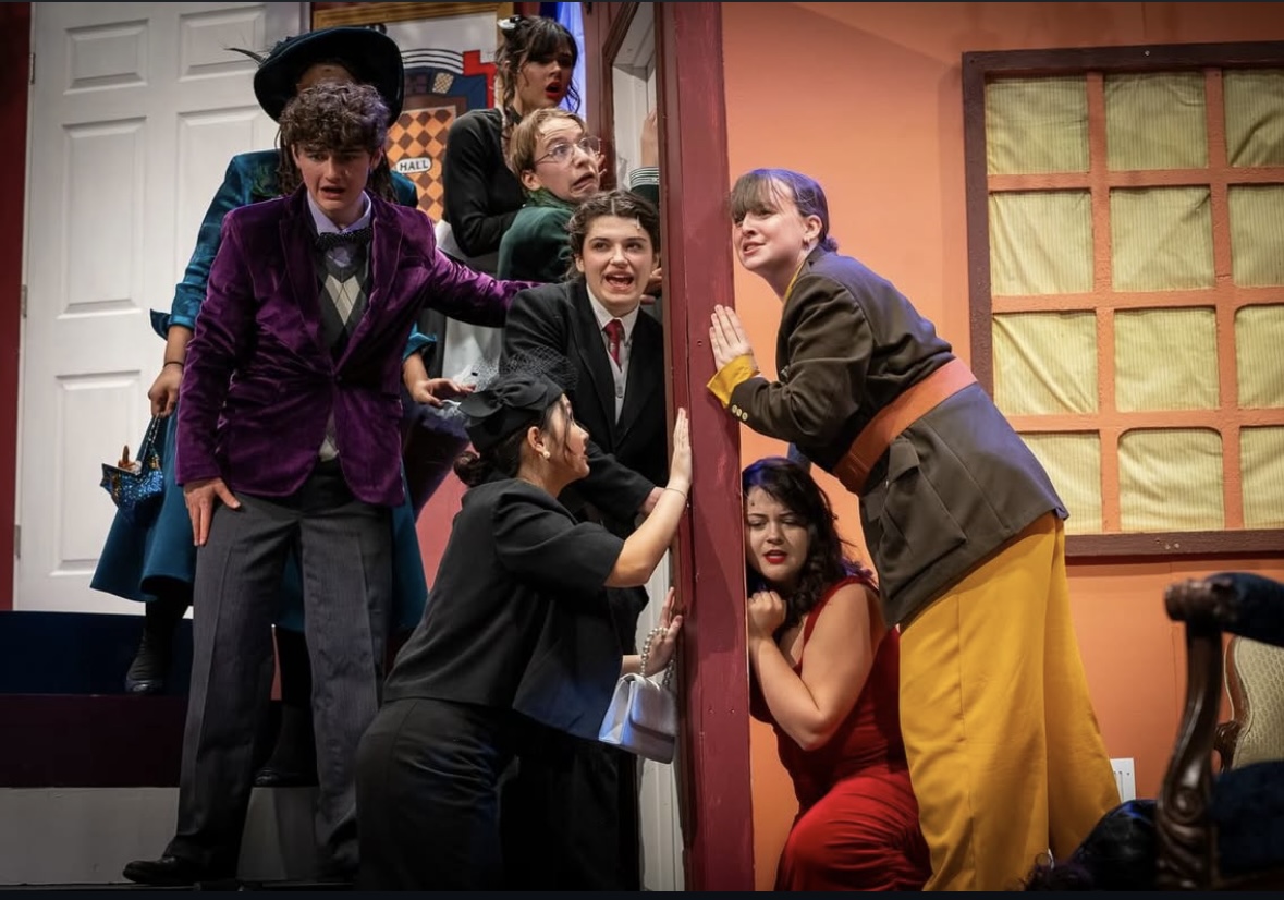 Cast members bring mystery and mayhem to life in the school’s production of Clue. 