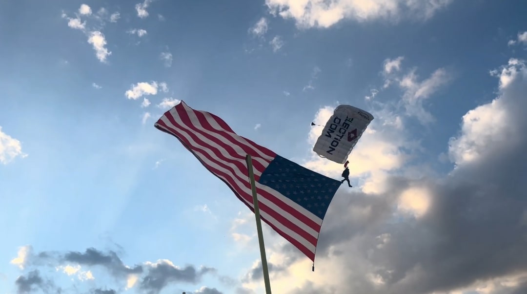 A paraglider floats down to Big Walnut's football field before their football game against Westerville South on Friday, Sept.19 
