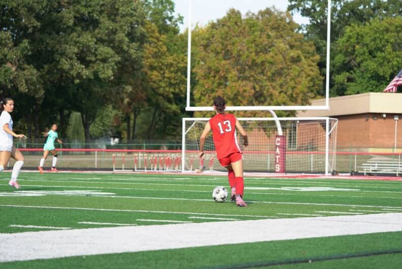 Catherine Rife dribbling towards the goal ready to score
