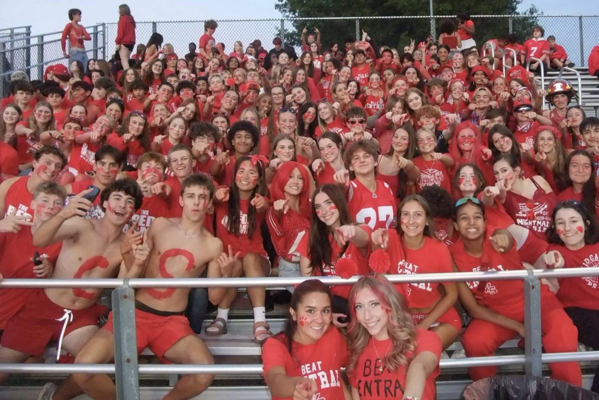 Westerville South student section takes a break from cheering a hard first half to take their weekly halftime photo. This photo was taken by Ava Parks, junior at Westerville South.