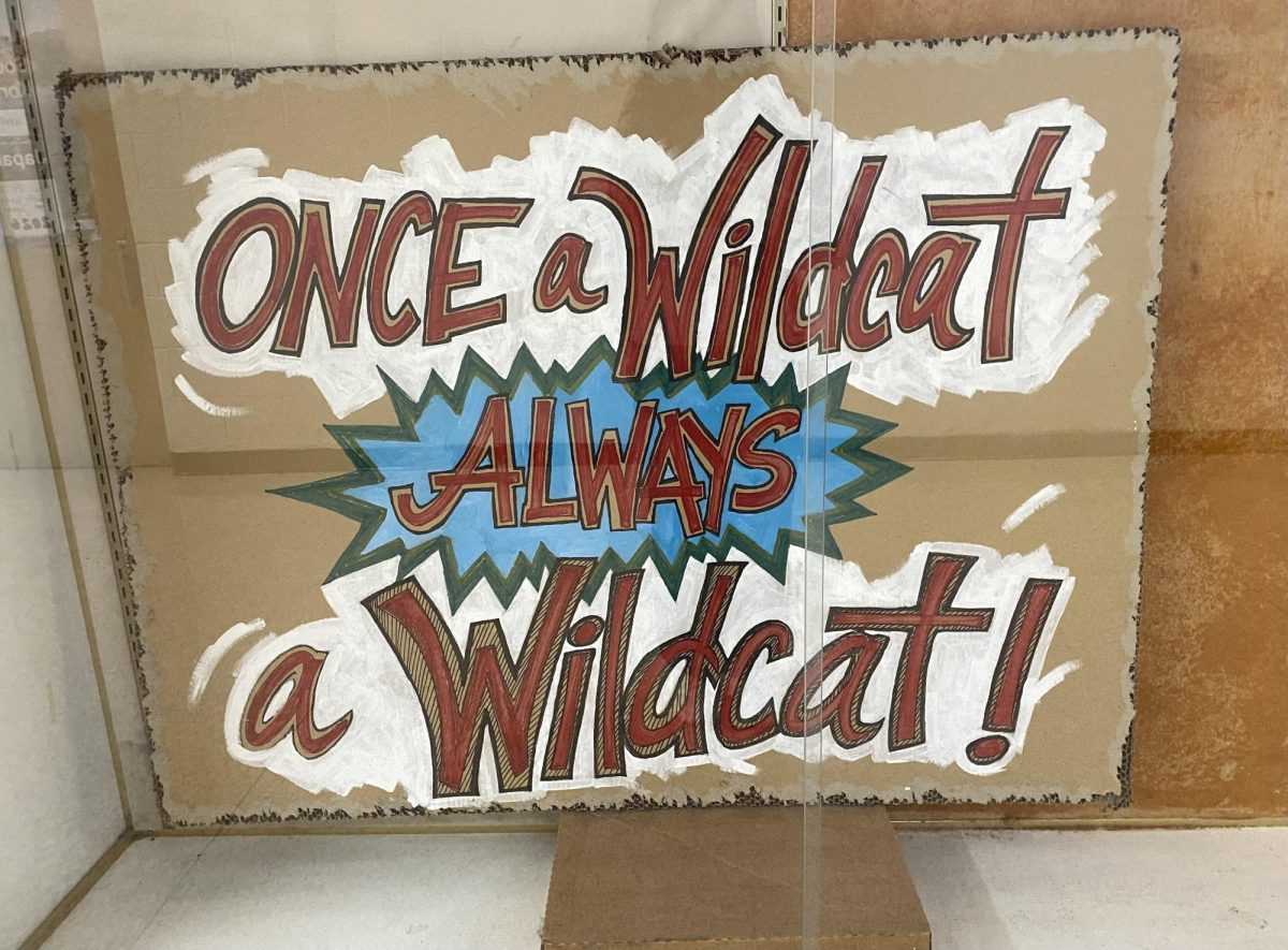 “Once a Wildcat, Always a Wildcat” is a phrase commonly used by teachers and administrators to affirm South as a place of belonging for its students, even after they’ve graduated. The sign is placed in a display case beside the media center, an area students frequently pass by during class changes.