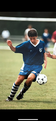 Quelette playing defense for his high school club soccer team his junior year.
