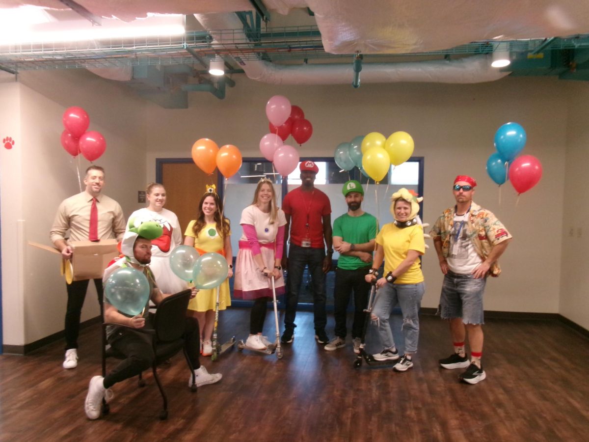 Westerville Souths upstairs Math department dressing up as Mario Cart Characters