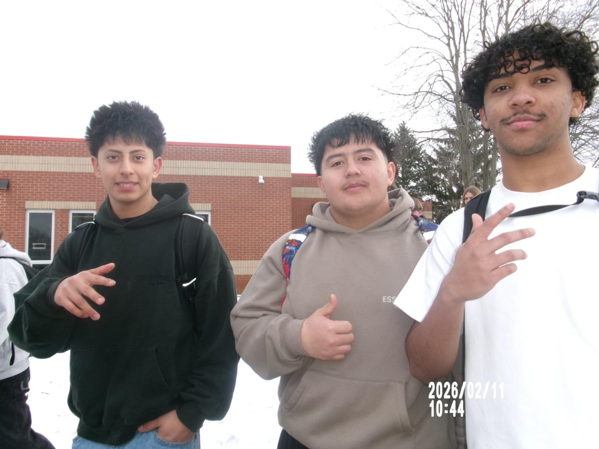 Many students joined the protest alongside their friends, walking out and around the school together. (from left to right) Seniors Oscar Nino Soto, Anthony Galdamez Mejia, and Carlos Martins De Souza shared they chose to walk out because it felt like the right thing to do. Photo by Sumira Adhikari.