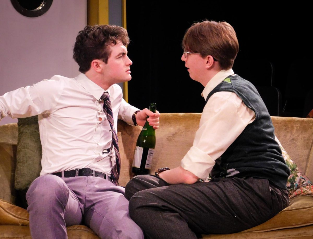 Bernard (Evan Bettac) and Robert (Lucas Lusher) reflect on their night of hijinx and excitement after getting out by the skin of their teeth.